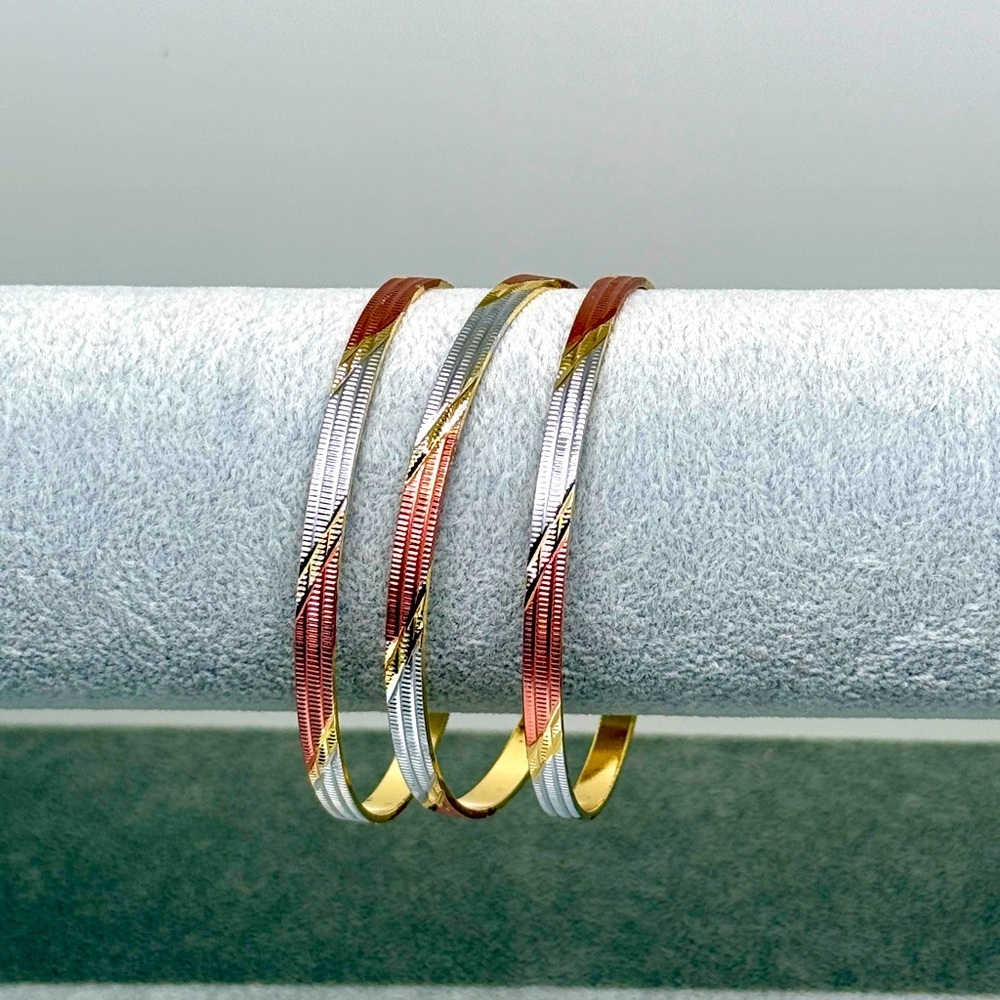 Gold plated bangles / bracelets, set of 3
8.5” 
New, Never worn